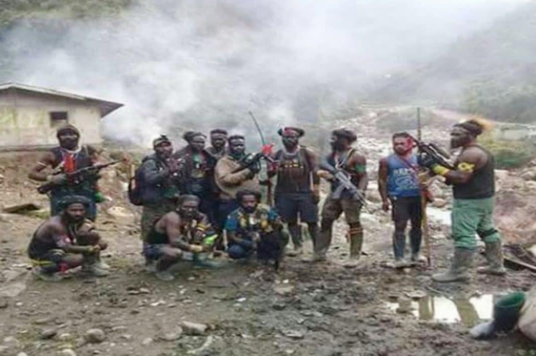 Kelompok Kriminal Bersenjata (KKB) yang menewaskan enam guru dan tenaga kesehatan.